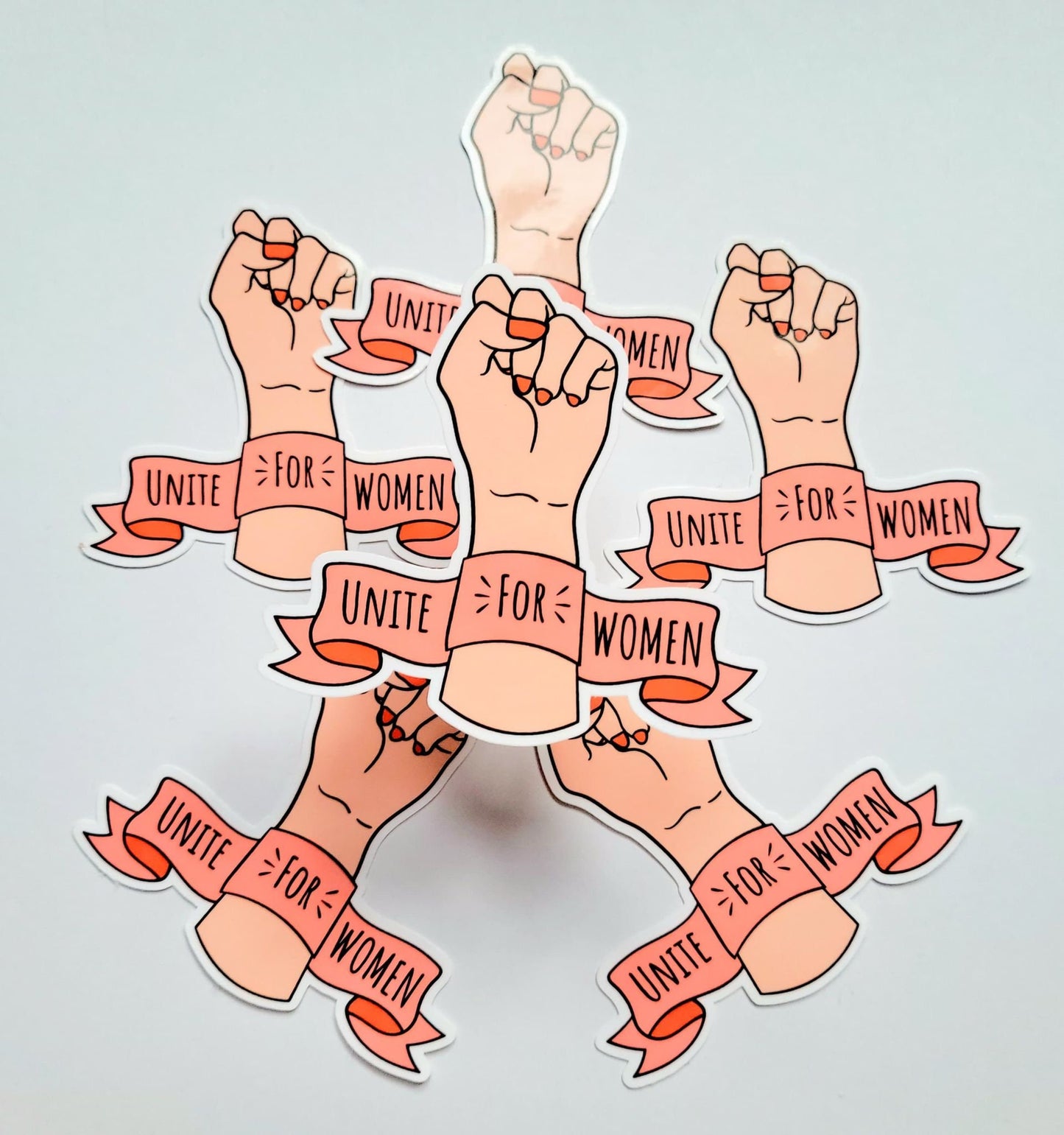 unite for women power fist